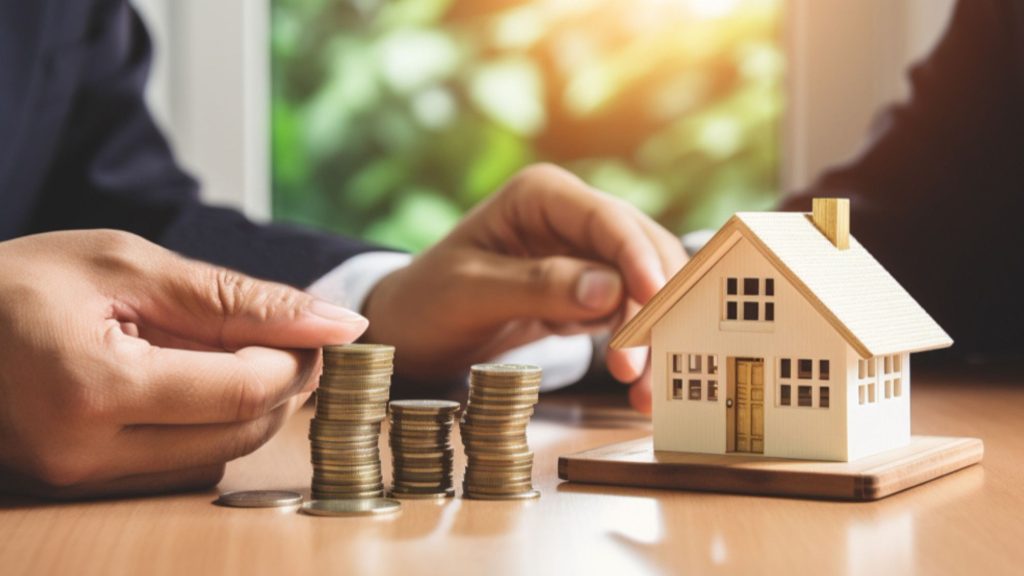 A house and money showing rental yields when purchasing an investment property